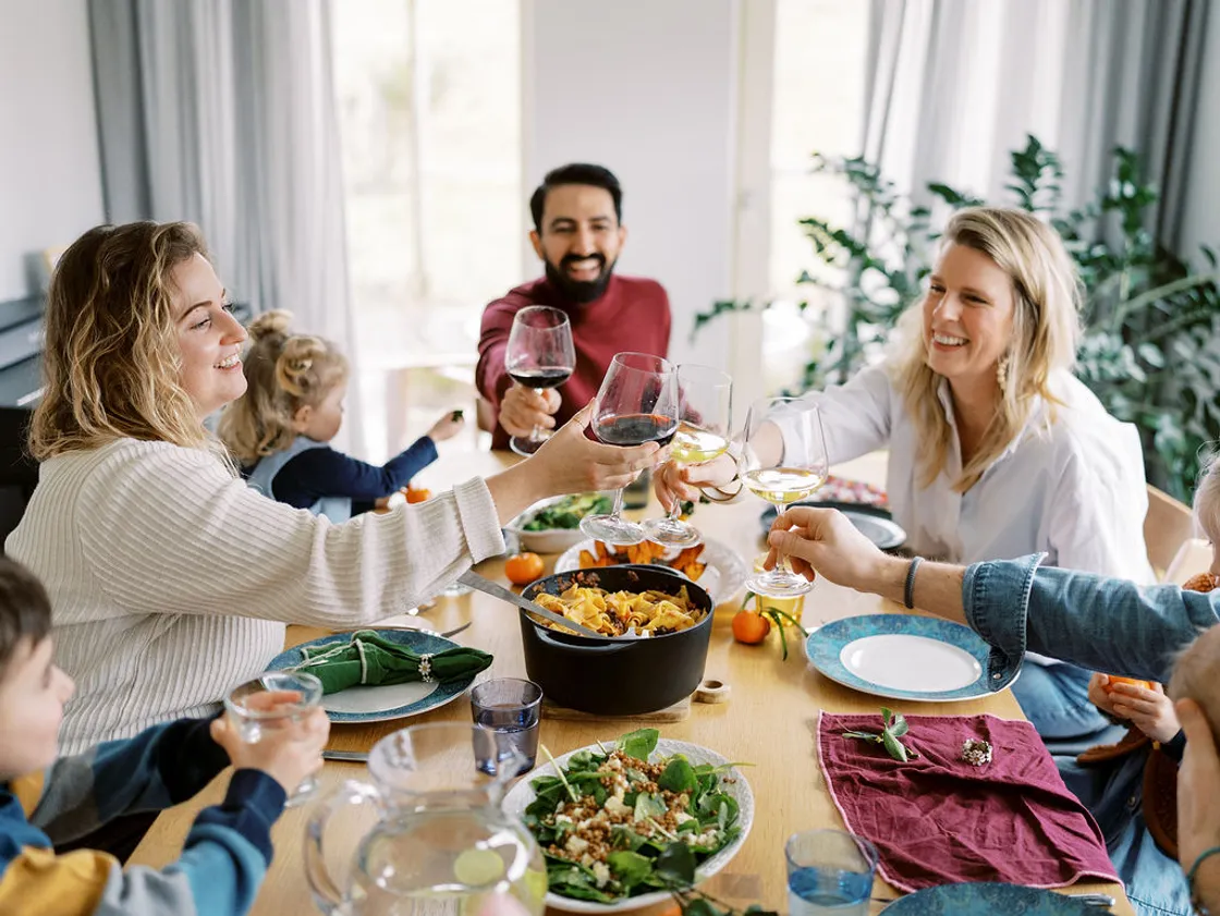 Host family sharing a meal